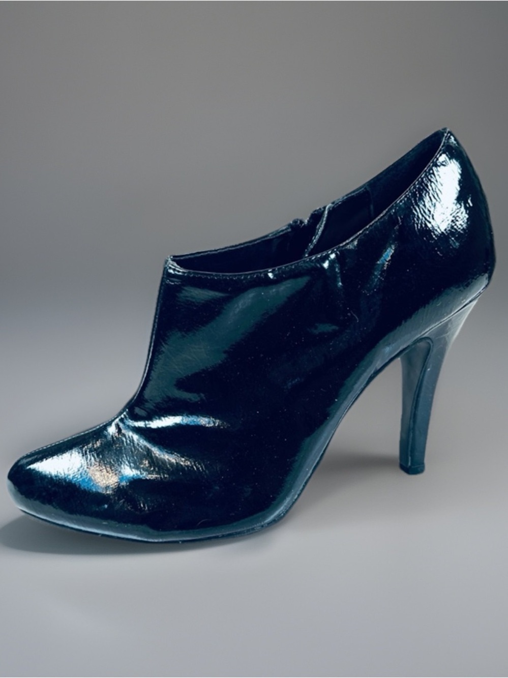 BLACK shiny Faux LEATHER Mod Ankle Booties…